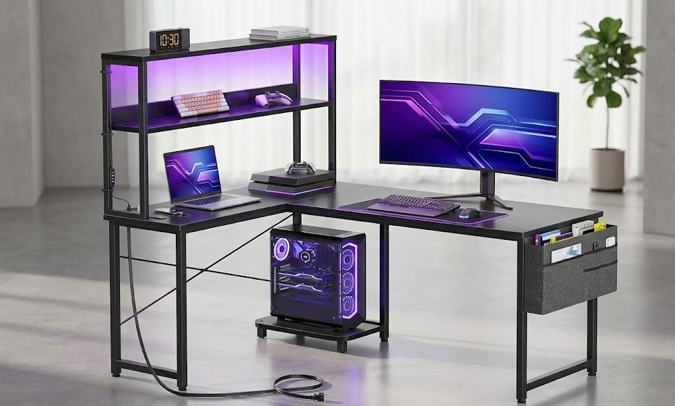 AODK 53-inch black L-shaped gaming desk illuminated by a built-in LED strip