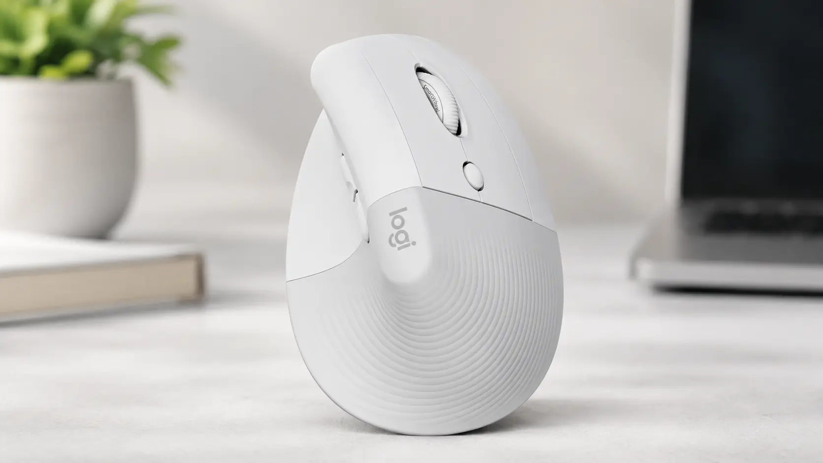 Off-white Logitech Lift for Mac vertical ergonomic mouse featuring a 57-degree vertical tilt to reduce forearm pronation.